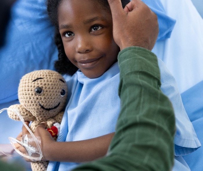 A child with doll in hand
