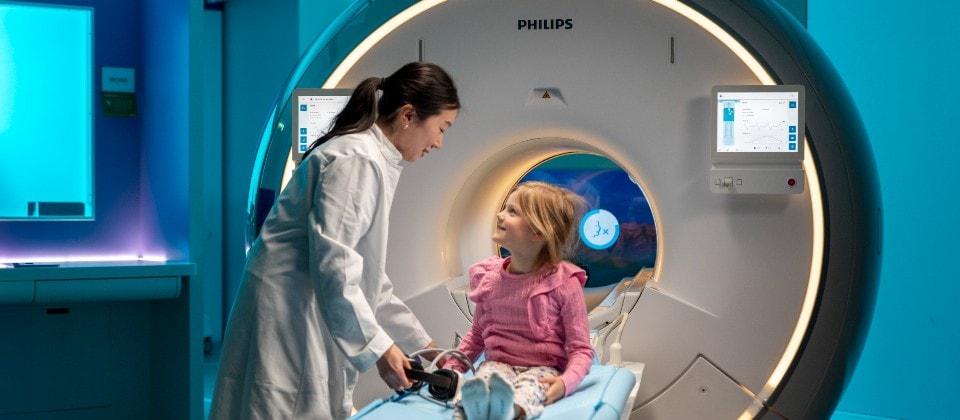 Pediatric patient being examined by medical professional