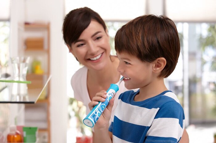 Child with Toothbrush