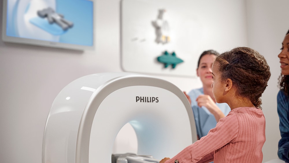 Download image (.jpg) (opens in a new window) Two doctors reviewing mammogram case