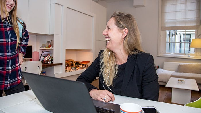 Saskia at home with her daughter