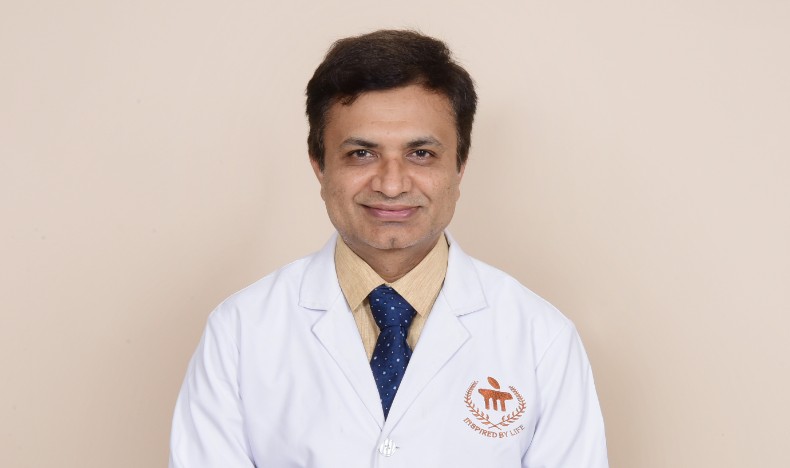 A portrait picture of Dr. Rajagopal K.V., Professor and Head of the Radio Diagnosis Department at KMC Manipal