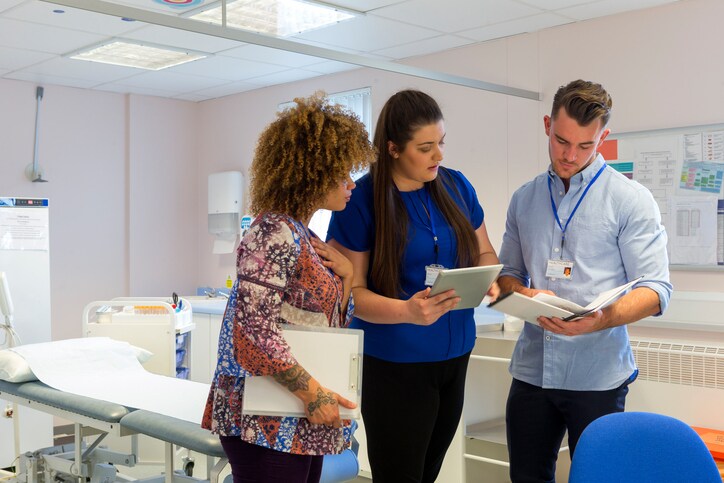 Hospital staff discussing patients medical results