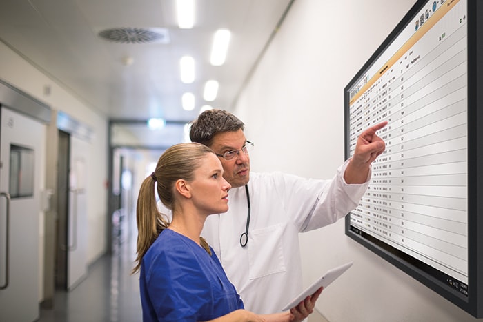 Philips IntelliVue Guardian dashboard clinicians reviewing patient data