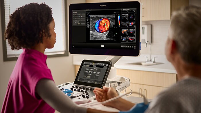 Download image (.jpg) (opens in a new window) A nurse using EPIQ Elite Ultrasound system.