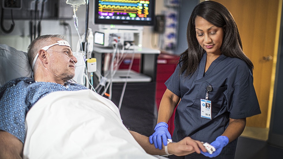 Doctor monitoring patient health