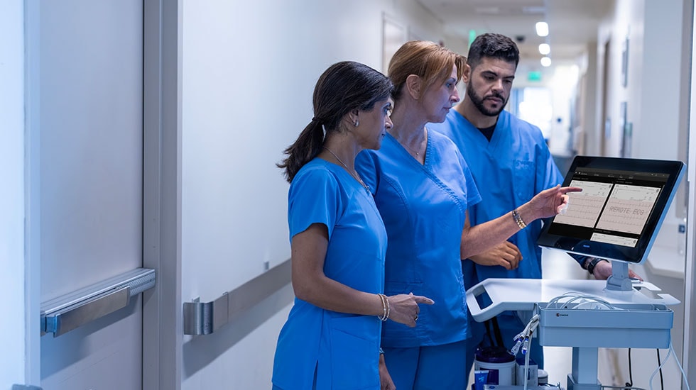 Clinicians review ECG data on Philips Cardiac Workstation