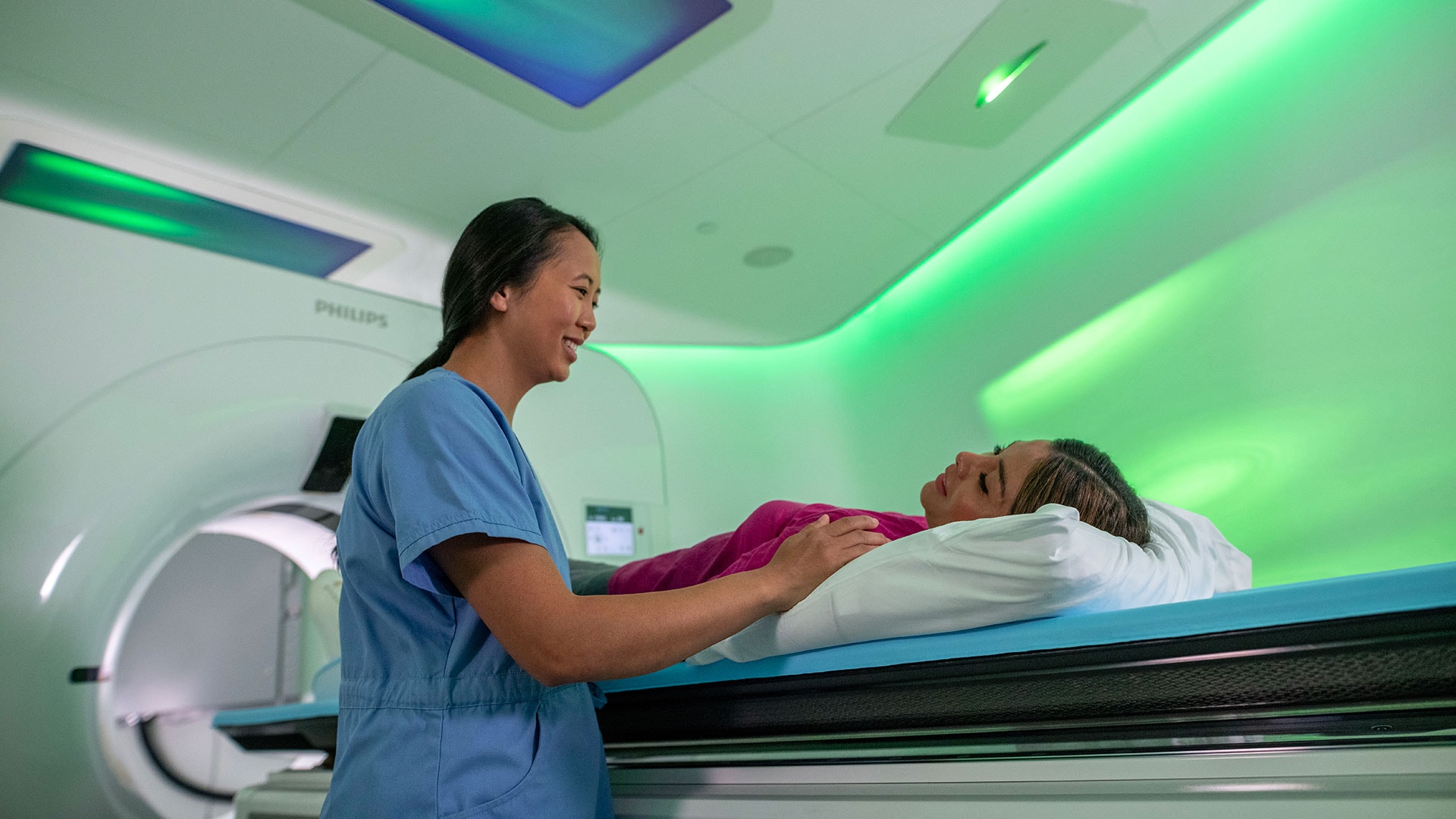Philips Ambient CT7500 in use with a clinician and patient