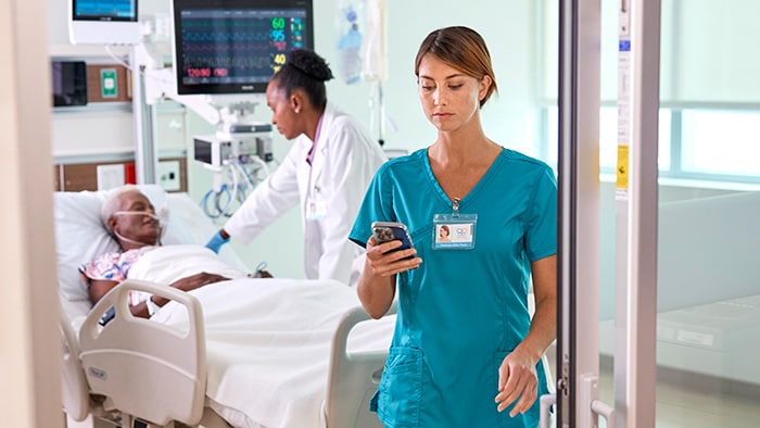 Nurse caring for patient -  