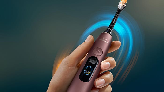 The on-device Mouth Map shows brushing coverage and missed areas -  