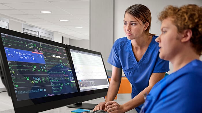 Nurses at central monitoring station -  