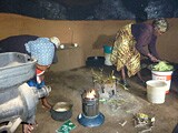 Women with wood stove
